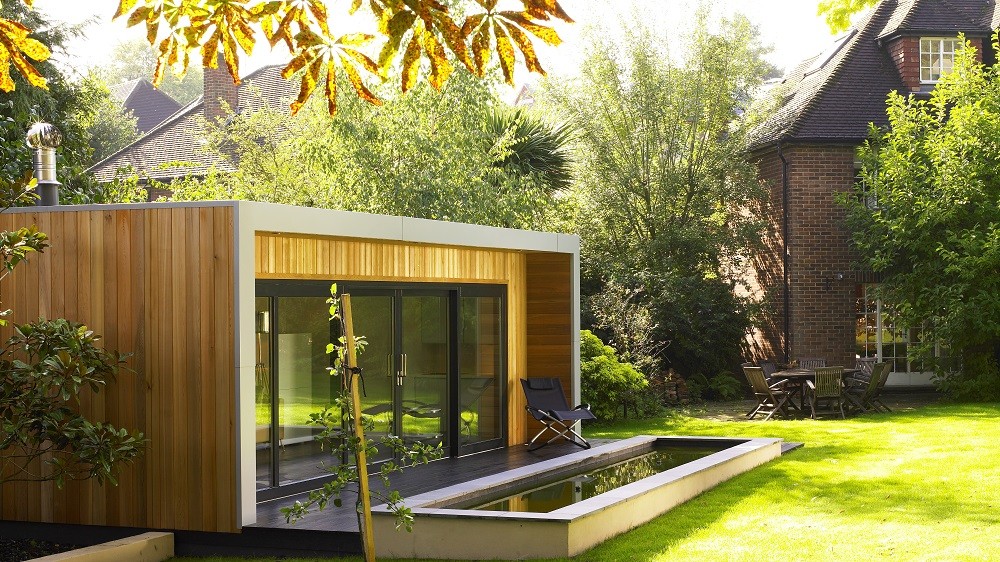 Cuberno garden room with Western red Cedar cladding in a landscaped garden