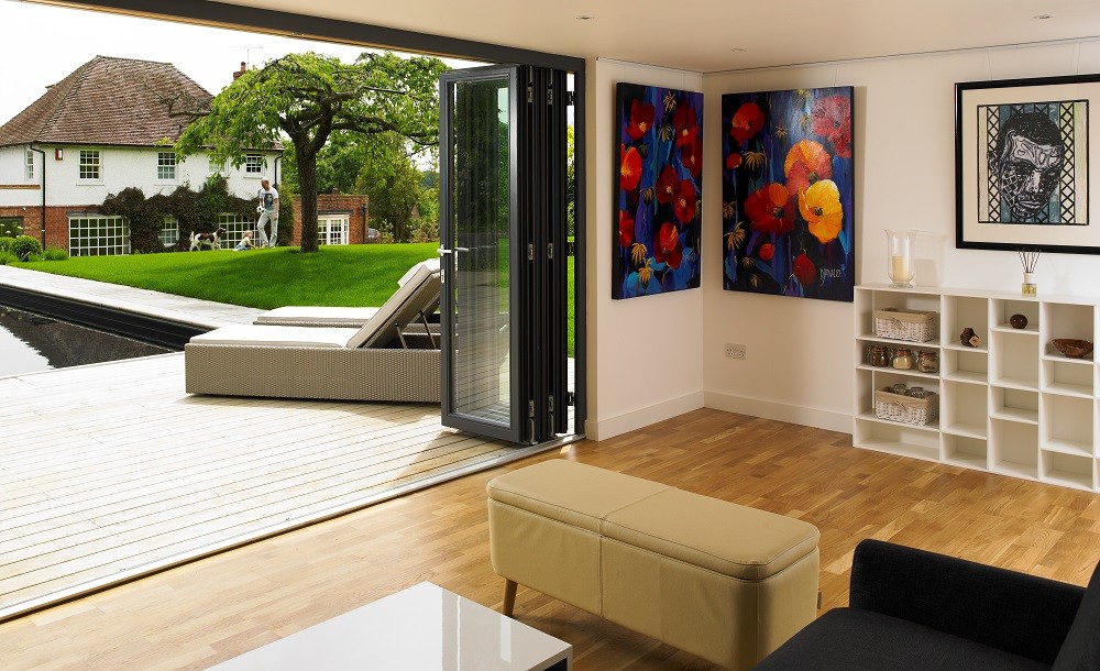 Poolside room with bifolding doors