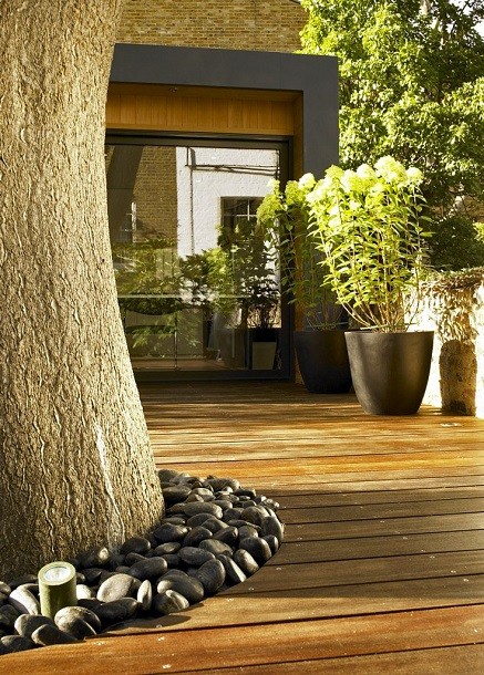 Deck and patio area with garden room