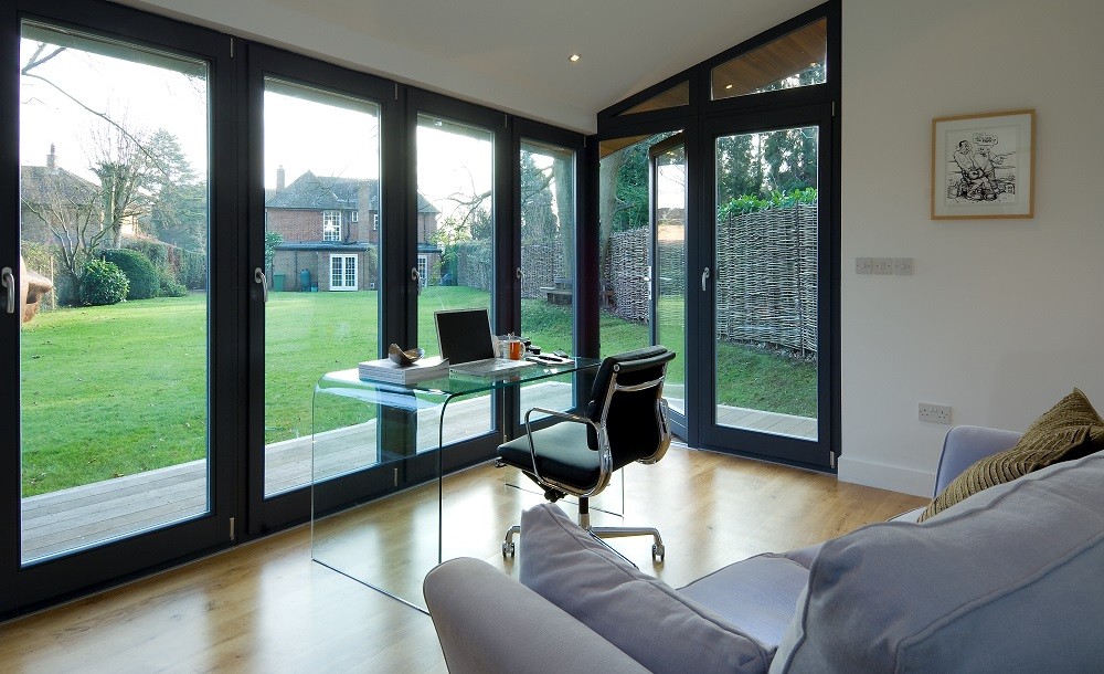 Bright bespoke garden office with glazing