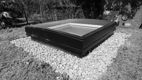 Green roof and velux window for a London garden office