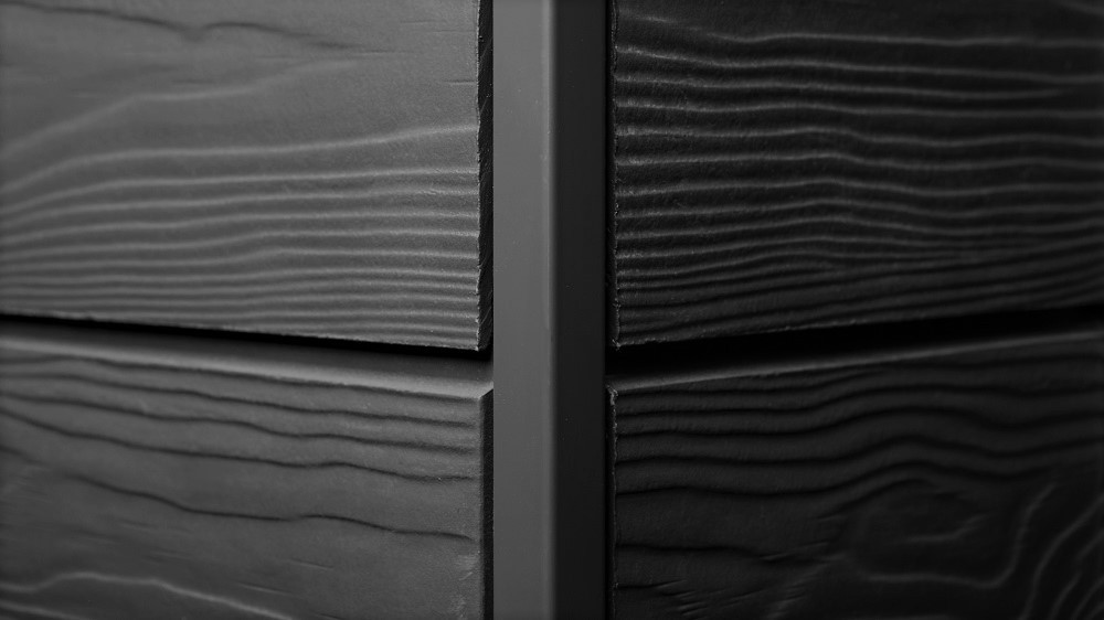 Composite cladding with a wooden effect texture for garden studios