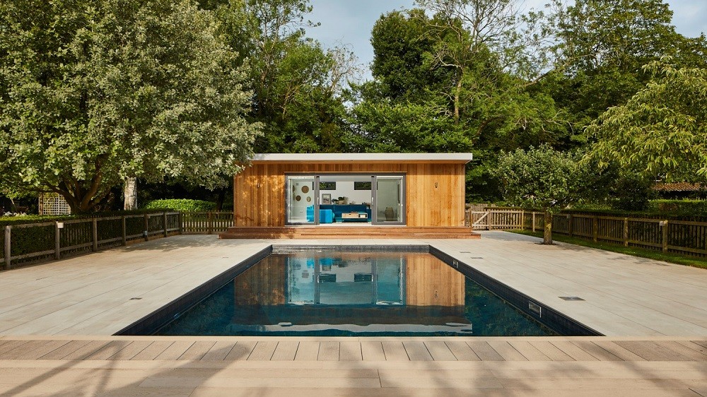 Pool side room with swimmingpool in Essex
