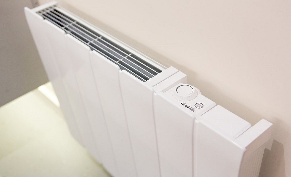 Wall mounted heater for garden rooms