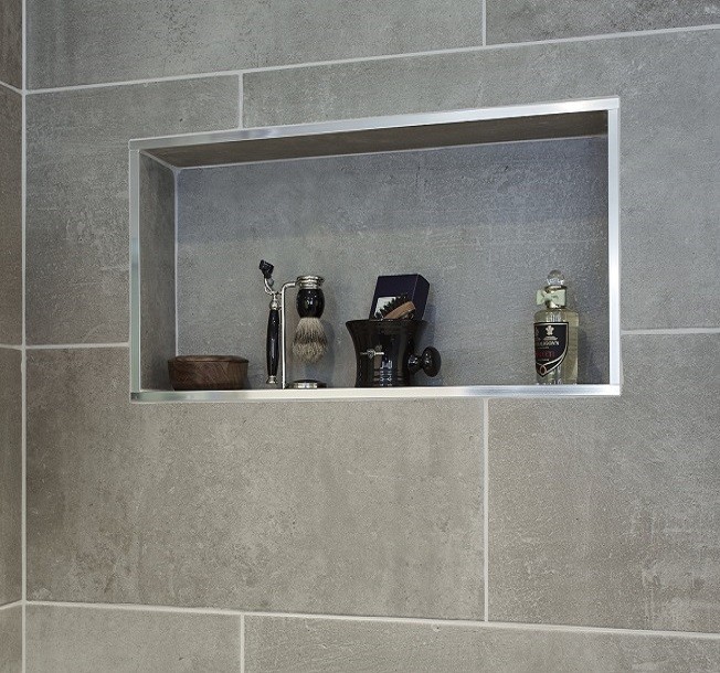 Recessed shower shelf in a garden room wet-room